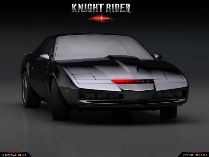 Svart sportbil med rörlig röd ljussignal framtill på mörk bakgrund, logotyp för Knight Rider överst.