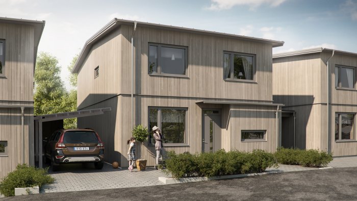 Modern villa med carport och två personer vid entrén.