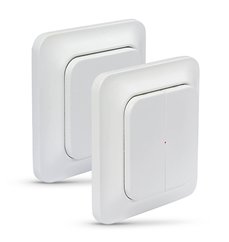 Två vita trådlösa väggströmbrytare avsedda för smarta hem-system.