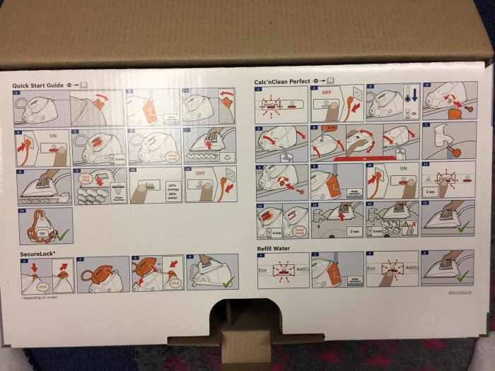 Kartong med snabbstartsguide för ångstrykjärn inklusive instruktioner om vattentank och låsfunktion.