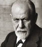 Svartvit bild av Sigmund Freud som tittar in i kameran.