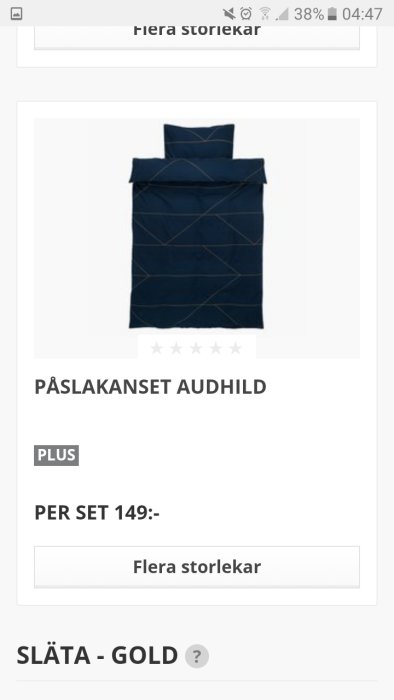 Marinblått påslakanset med geometriskt mönster föreslås för mörkgrått sovrum.