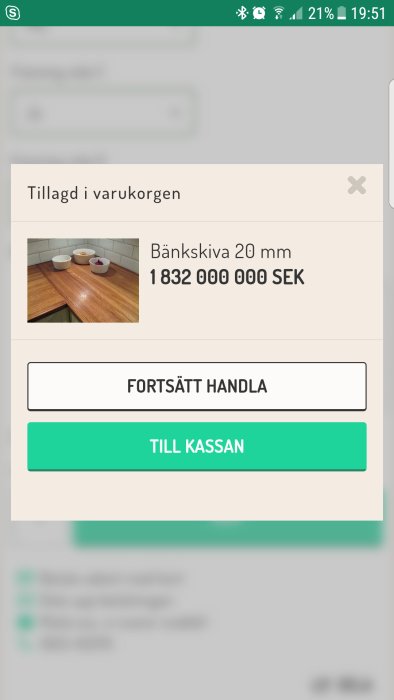 Skärmbild av onlinevarukorg med bänkskiva i ek och pris 1 832 000 SEK.