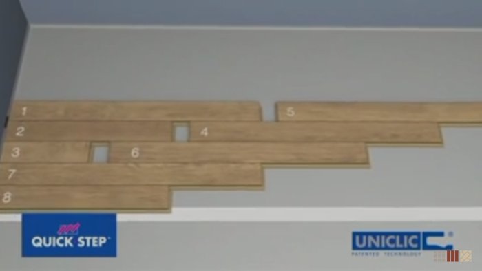 Illustration av parkettläggning med numrerade brädor för mönsterläggning.