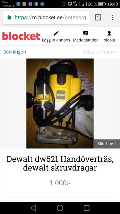 Dewalt dw621 handöverfräs på ett bord, använd men i gott skick, med tydliga varumärkesfärger och priset angivet.