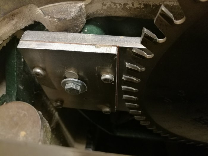 Riving knife fitted to a Wadkin AGS10 saw, showing close-up of the knife and saw blade.
