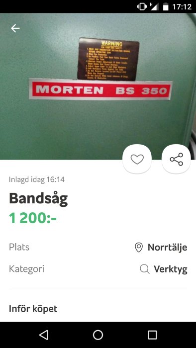 Grön bandsåg Morten BS 350 med varningsetikett och prisangivelse 1200 kr.