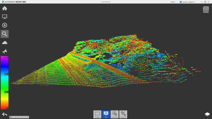 Färgkodat punktmoln som visar terrängtopografi i Autodesk ReCap 360 programvara.