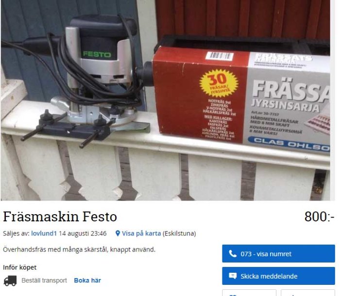 Fräsmaskin Festo på en pall med tillhörande förpackning från Clas Ohlson.