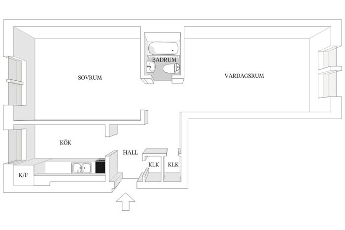 Planritning över en lägenhet med sovrum, badrum, vardagsrum, kök och hall markerade.