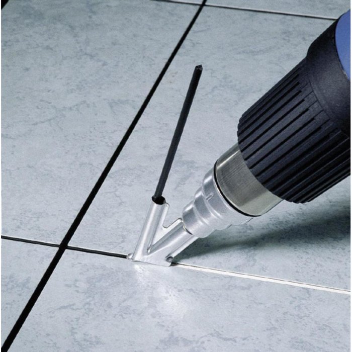 Borrmaskin används för att borra i kakelfog mellan klinkerplattor.