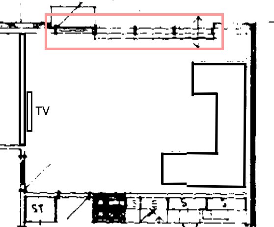 Ritning av ett rum med markerad plats för TV och en framhävd detalj överst.