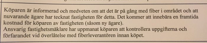 Textavsnitt ur kontrakt om övergång av fiberinstallation som framtida kostnad för köparen av en fastighet.