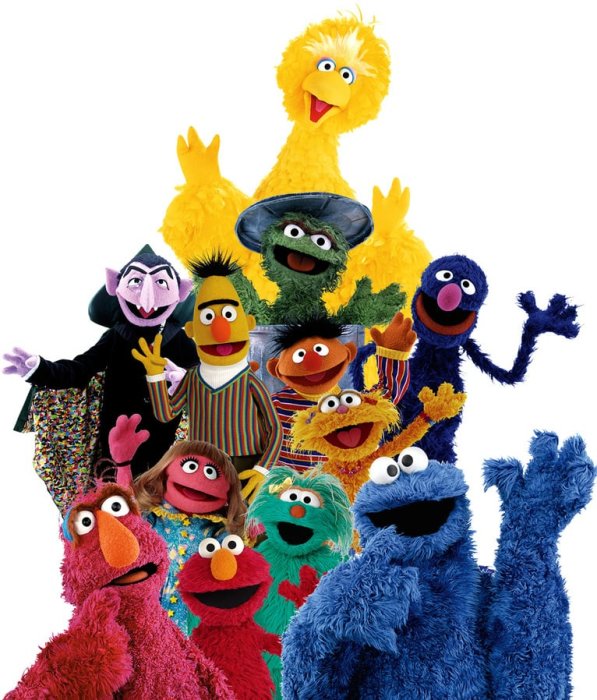 Samling av färgglada och glada Muppar inklusive Big Bird, Elmo och Cookie Monster.