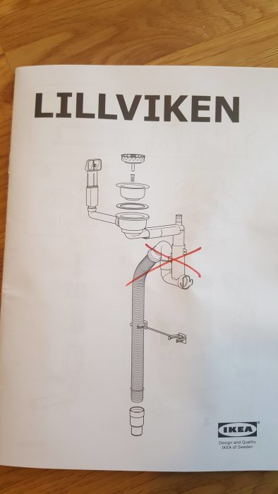 IKEA LILLVIKEN vattenlås instruktion med röd linje som visar var delar ska kapas för anpassning till 40mm avlopp.