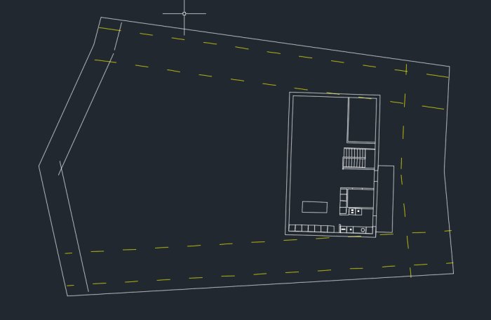 Schematisk planritning som visar placering av fristående garage och huvudbyggnad på en tomt.