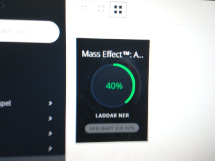 Skärmdump som visar nedladdningsstatus på 40% för spelet Mass Effect.