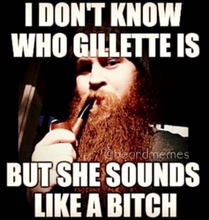 Person med ett kraftigt skägg som röker pipa, med texten "I DON'T KNOW WHO GILLETTE IS BUT SHE SOUNDS LIKE A BITCH".