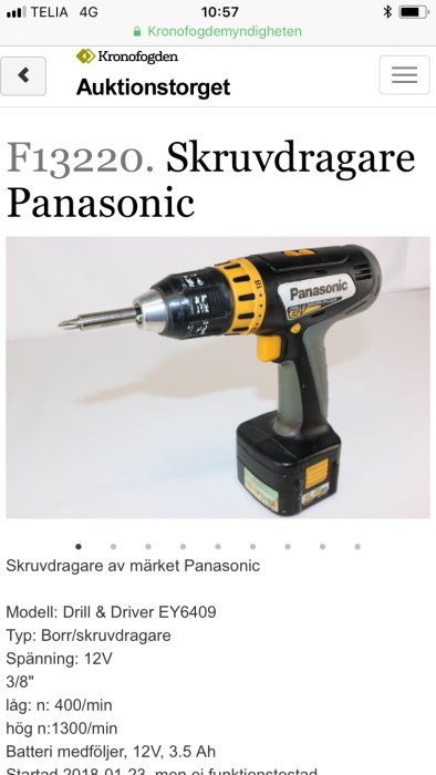 Panasonic borrmaskin/skruvdragare modell EY6409 med batteri, står på vit bakgrund, visad i en auktionsannons.