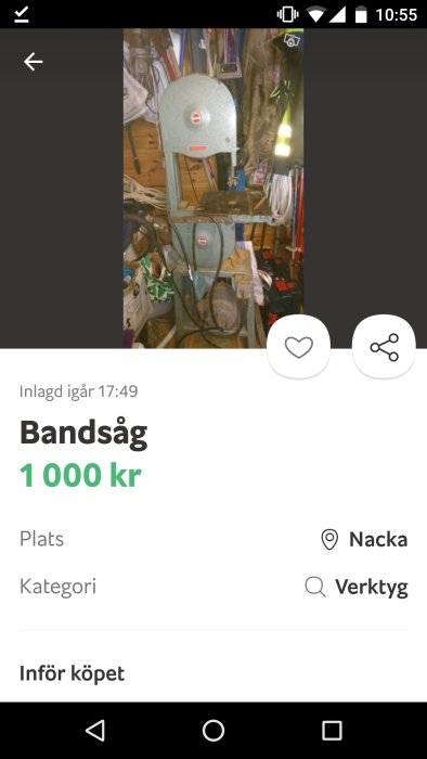 Begagnad bandsåg till salu för 1000 kr, placerad i en verkstad.