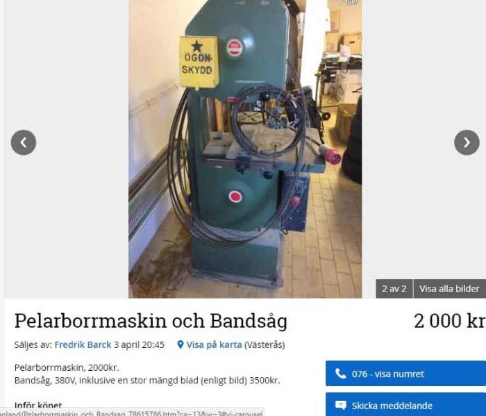 Grön bandsåg med anslutna kablar och skylt som säger "ÖGON SKYDD" placerad i ett verkstadsutrymme.