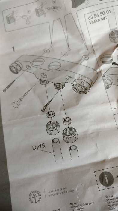 Exploded view diagram illustrating assembly of a sink's drain system with annotations and measurements.