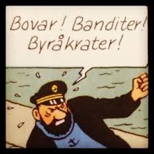 Seriefigur förargar sig och ropar "Bovar! Banditer! Byråkrater!" som illustration av frustration.