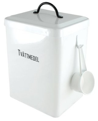 Vit burk för tvättmedel med lock och skopa, etikett "Tvättmedel".