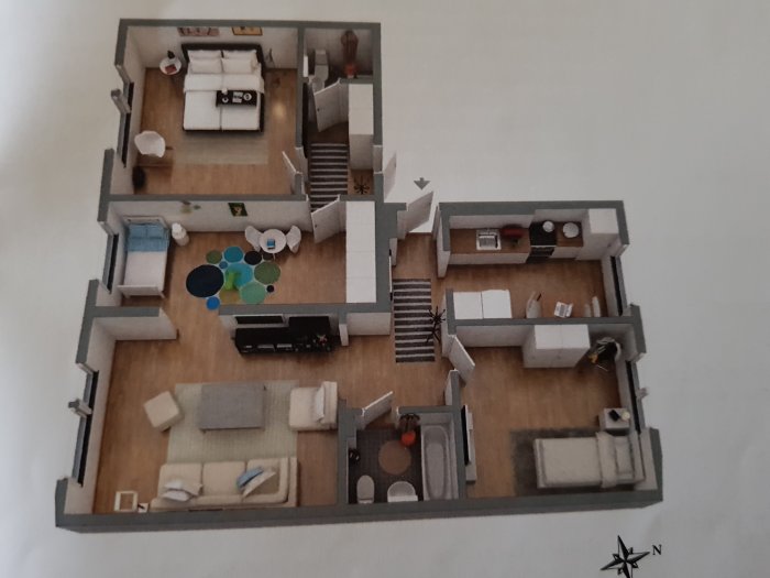 3D-planlösning av en ihopslagen lägenhet med markerade förslag till ombyggnation.