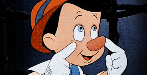 Pinocchio med växande näsa, symbol för lögn i animerat gif-format.