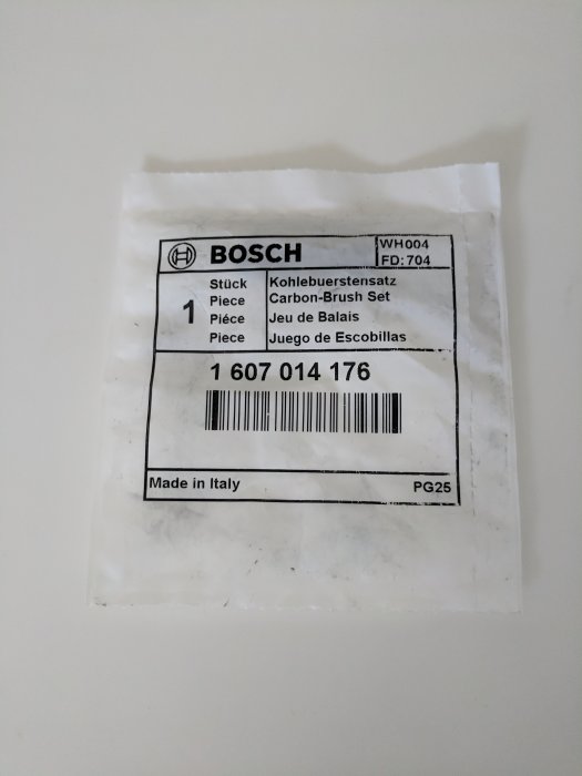 Förpackning med ett set kolborstar märkta Bosch, avsedda för en GWS 125 verktyg.