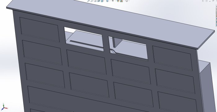 3D-skiss av sänggavel med inbyggd förvaring och dolda skjutluckor i överkant.