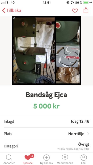 Bandsåg med skyddsgrind i verkstad, inklusive förpackade sågblad och priset 5000 kr.