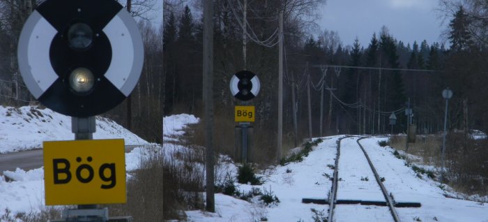 Järnvägsförsignaler med gula märktavlor för trafikplatsen Brännögård, täckt av snö.