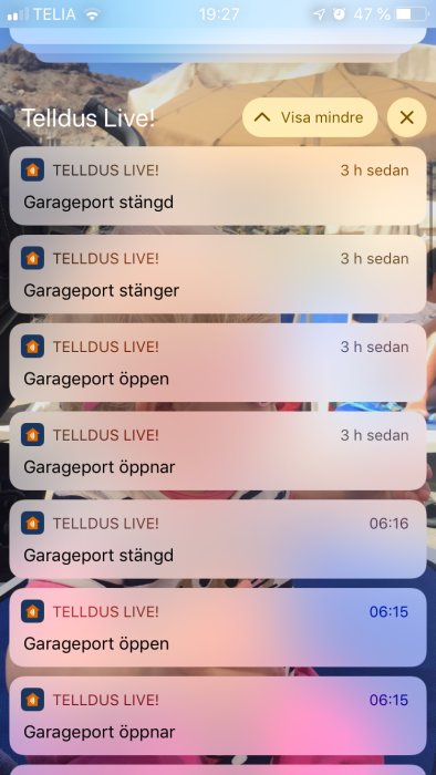 Skärmdump av Tellus Live-app med notiser om en garageports statusändringar.