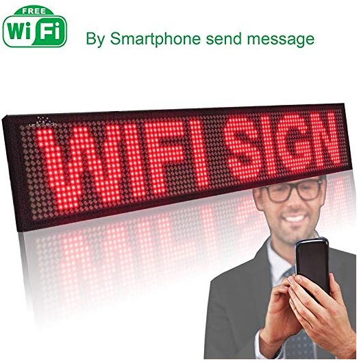 LED-skylt med texten "WIFI SIGN" och en suddig man i bakgrunden som håller en smartphone.