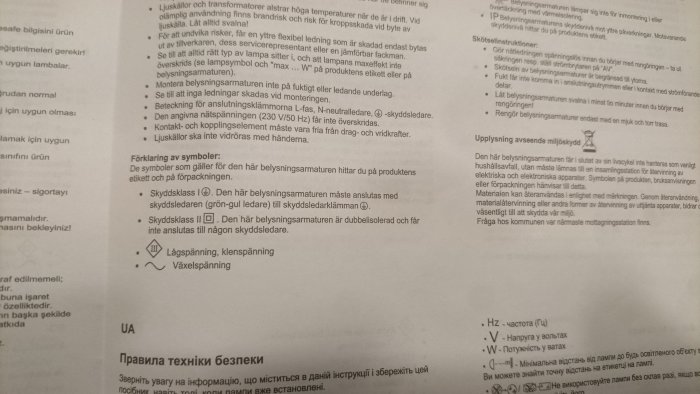 En rörig instruktionsmanual på flera språk med symboler för elektrisk utrustning.