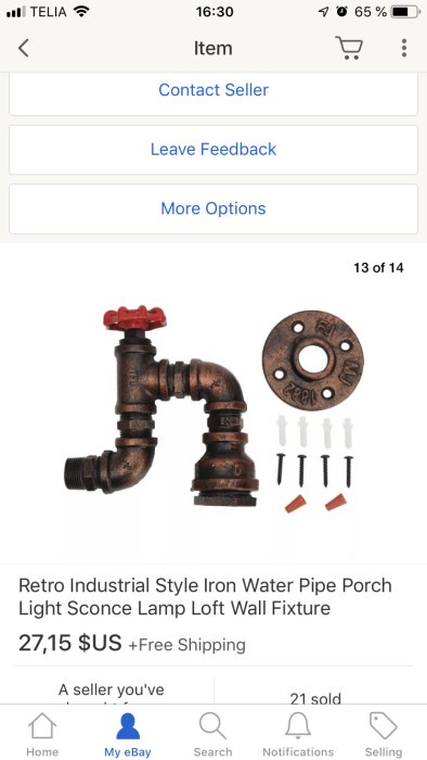 En rödrostig industristil lampa designad som ett vattenrör med fel form och färg, annonserad på eBay.