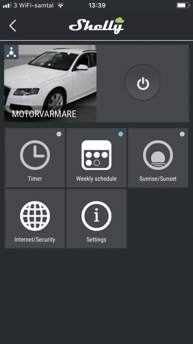 App-interface för Shelly med meny för motorvärmare, timer, veckoschema och soluppgång/solnedgång.