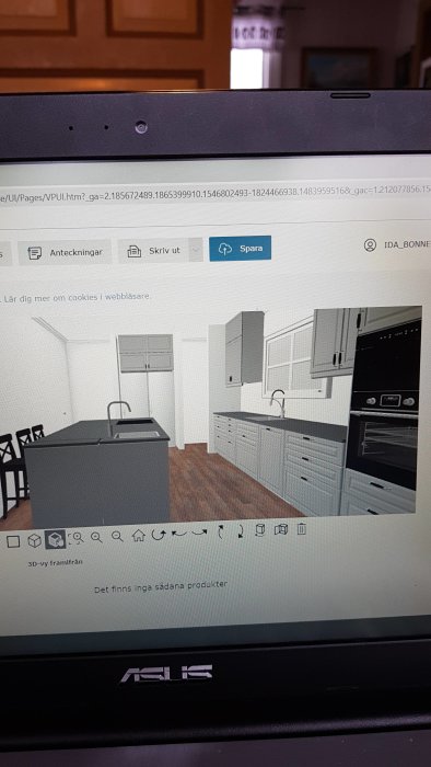 Skärmdump av dator som visar ett 3D-program med design av ett modernt kök med vita skåp och grå bänkar.
