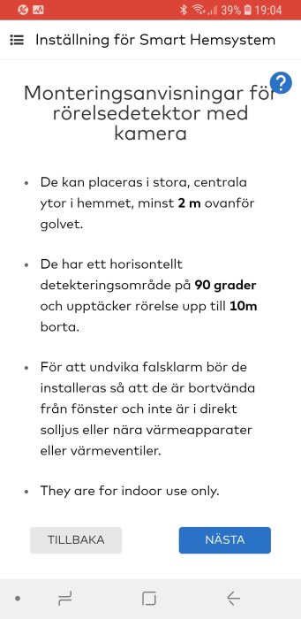 Skärmdump av installationsguide för rörelsedetektor med kamera på en smartphone.