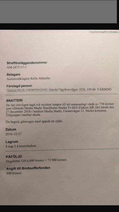 Bild av ett strafföreläggande dokument med detaljer kring ett stöldfall och påföljd av dagsböter och avgift till Brottsofferfonden.