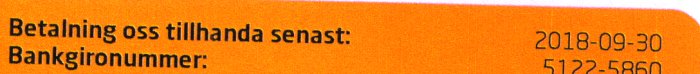 En fakturadel med texten "Betalning oss tillhanda senast: 2018-09-30 Bankgironummer: 5122-5860" på orange bakgrund.