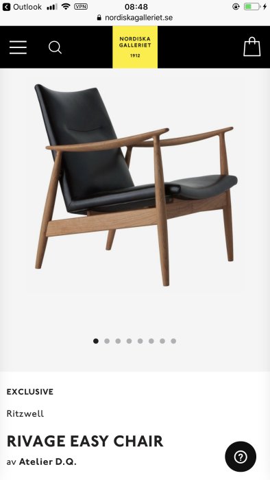 Designfåtölj 'RIVAGE EASY CHAIR' i svart läder och trä från Atelier D.Q.