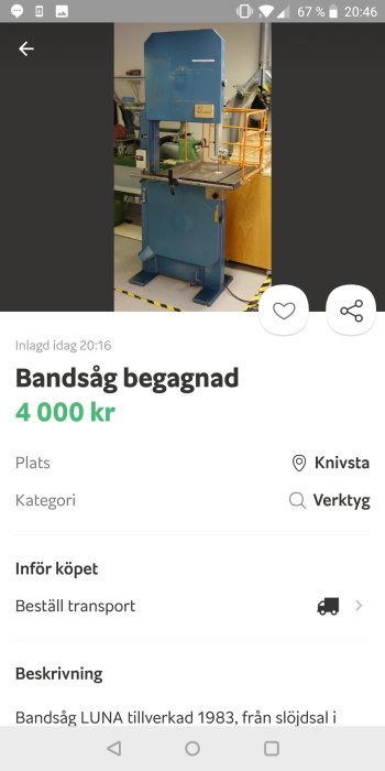 Begagnad blå LUNA bandsåg från 1983 i ett verkstadsutrymme.