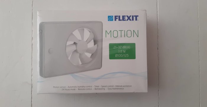 Ouppackad Flexit Motion ventilator i förpackning på vit bakgrund.