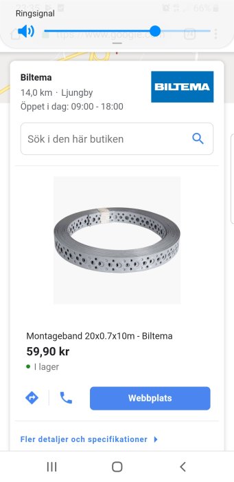 Rulle av perforerat montageband på vit bakgrund från Biltema.