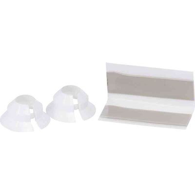 Två genomskinliga kupade rörtäckningar från Gelia intill en bit vit plåt.