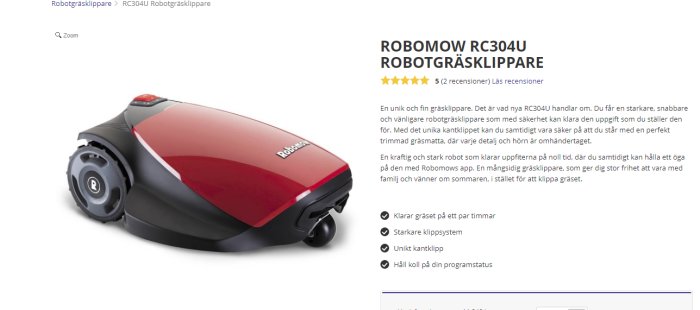 Svart och röd robotgräsklippare, liknar en nyckelpiga, modell Robomow RC304U.