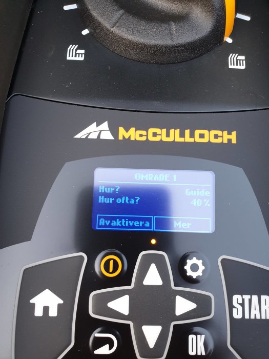 Display på en McCulloch S600 robotgräsklippare visar inställningsmenyn för klippoämradet.